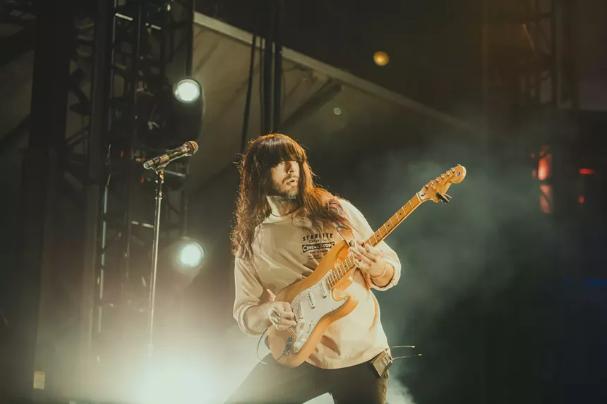 Mark Speer, guitar and vocals for Khruangbin, rocking out on stage at the Outside Festival.