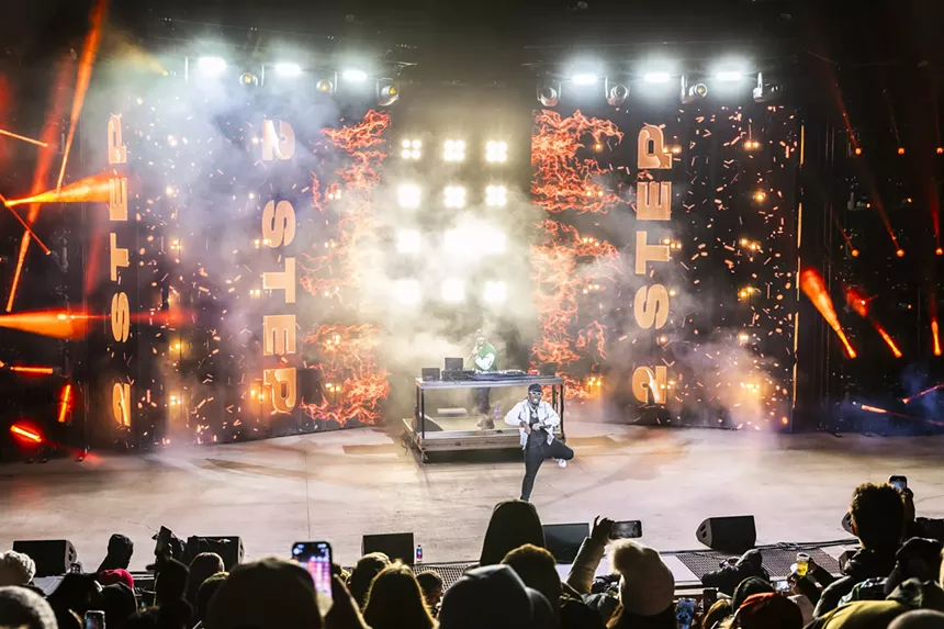 A photo showing the Red Rocks crowd during T-Pain's healdining performance.