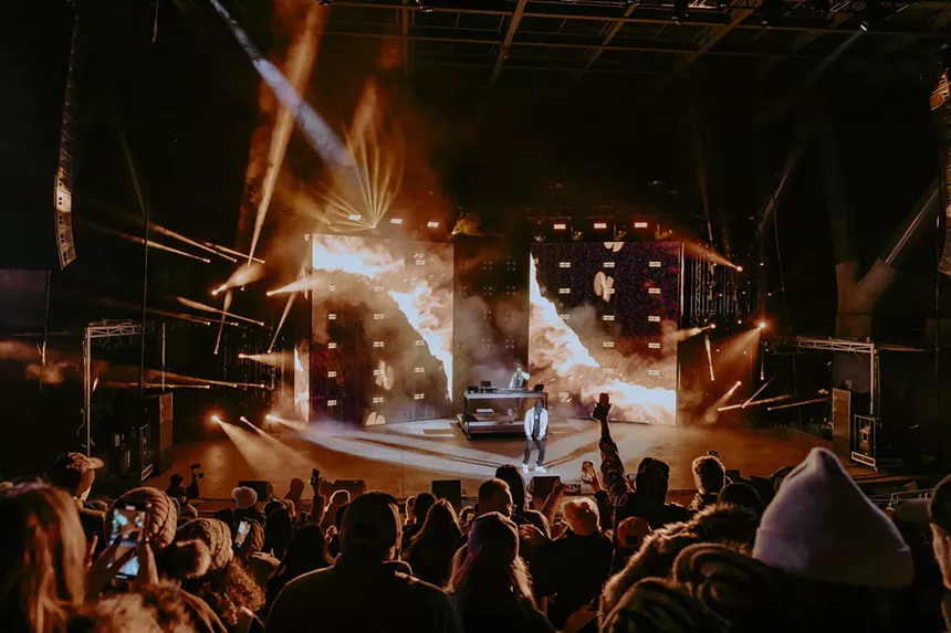 A photo showing the Red Rocks crowd during T-Pain's healdining performance.