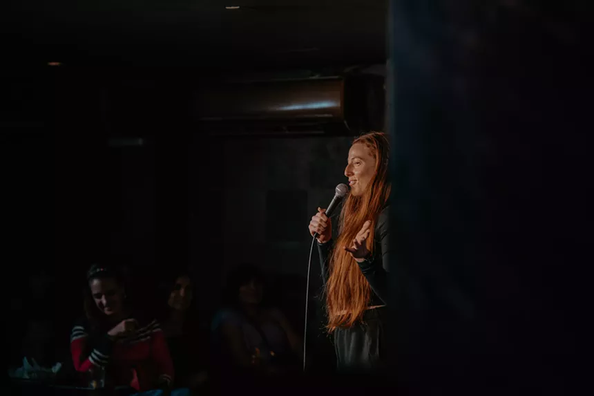A comedian performs on stage at Comedy Works.