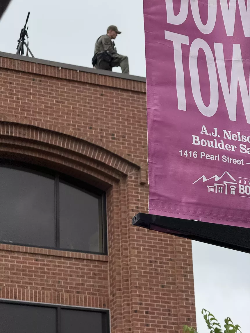 A sniper surveys the crowd below at the Boulder Jewish Festival