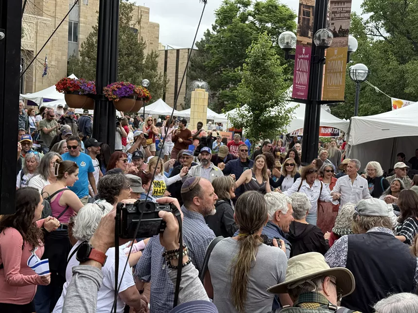 Attendees at the Boulder Jewish Festival dance the hora, a celebratory circle dance