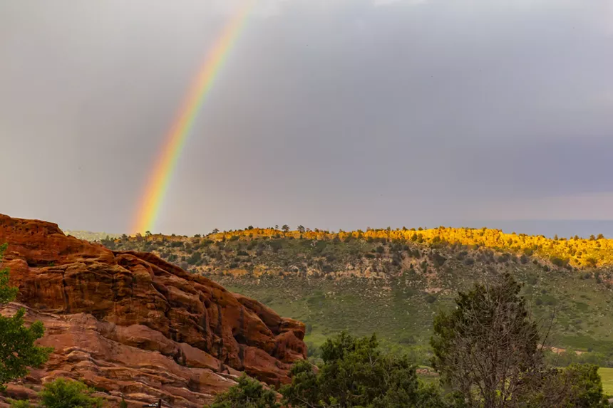 A picture of a rainbow at Red Rocks.