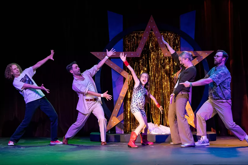 A group of actors perform onstage in Aurora Fox's Little Miss Sunshine.