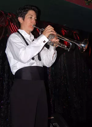A woman playing a trumpet