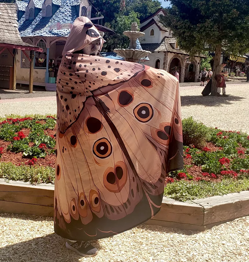 A person in a moth costume