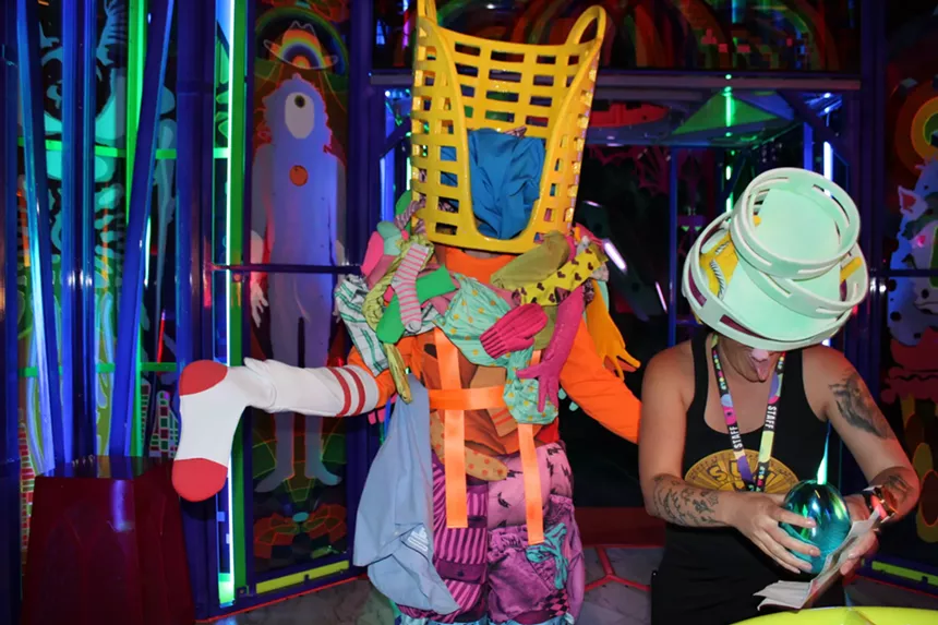 Actors rehearse a scene for an immersive performance at Meow Wolf in Denver.