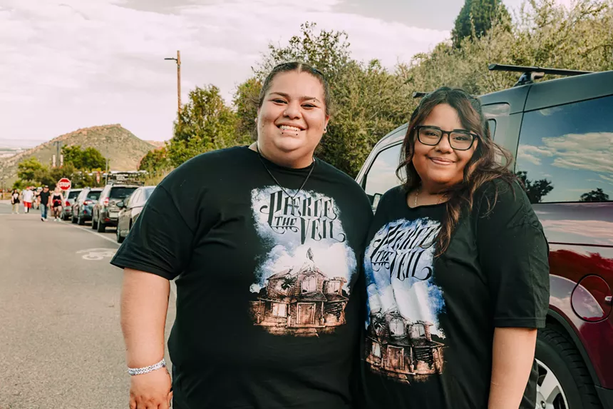 Pierce The Veil fans wearing artist merch.