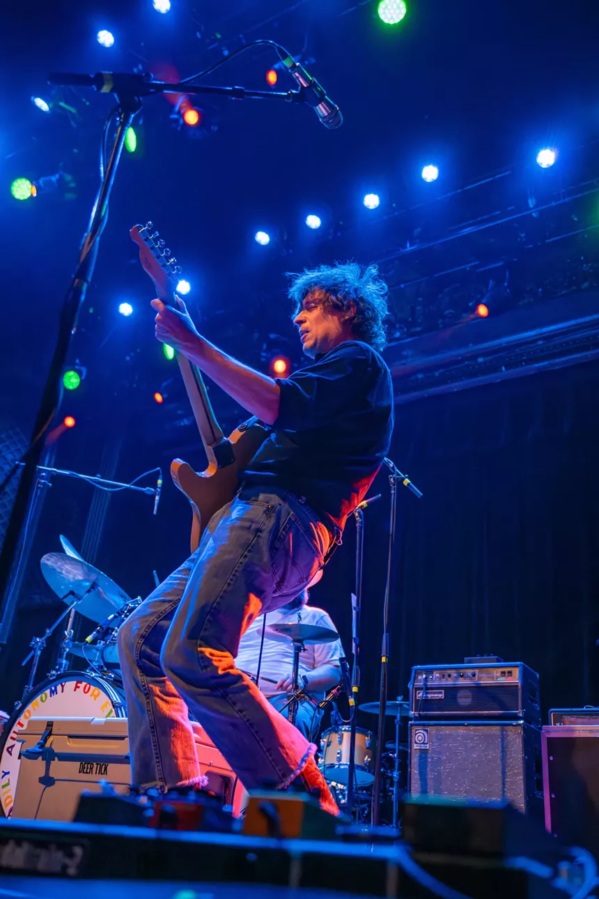 Ian O'Neil playing guitar