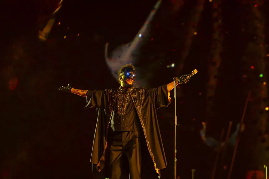 The Weeknd on stage at Empower Field at Mile High for his After Hours Til Dawn Tour on Saturday, June 21.