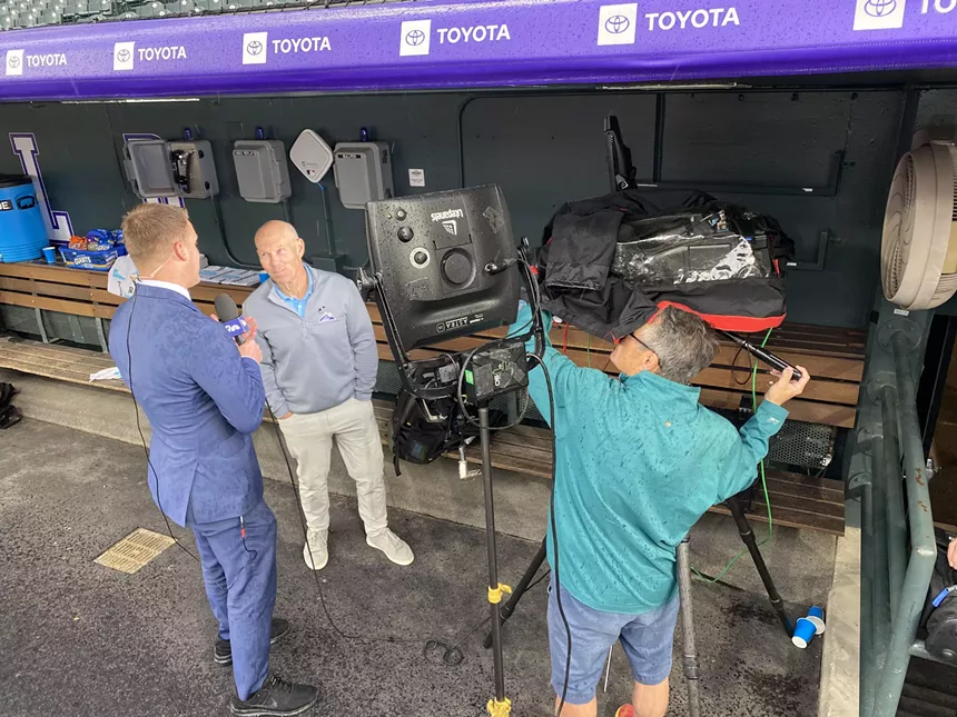 local media interview in dugout before Rockies baseball game