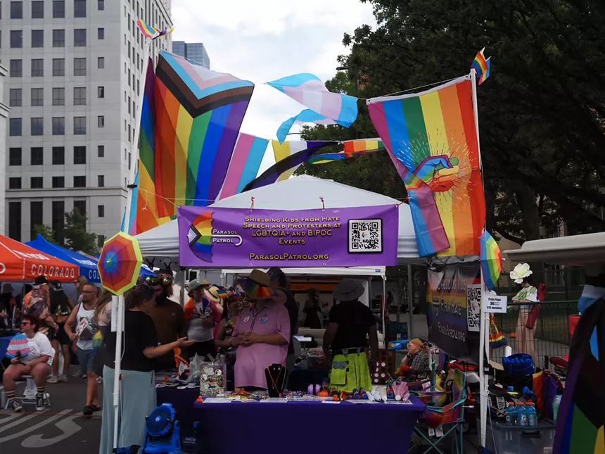 A booth with rainbow flags