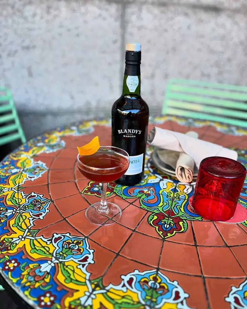 bottle of wine on patio.