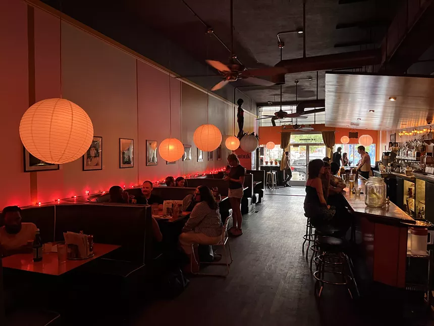 a diner with colorful lights