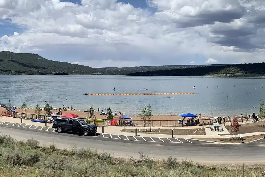 A panoramic view of Lake Nighthorse featuring its dedicated swim beach