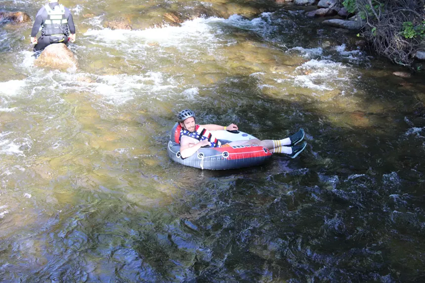 Man floats in the creek.