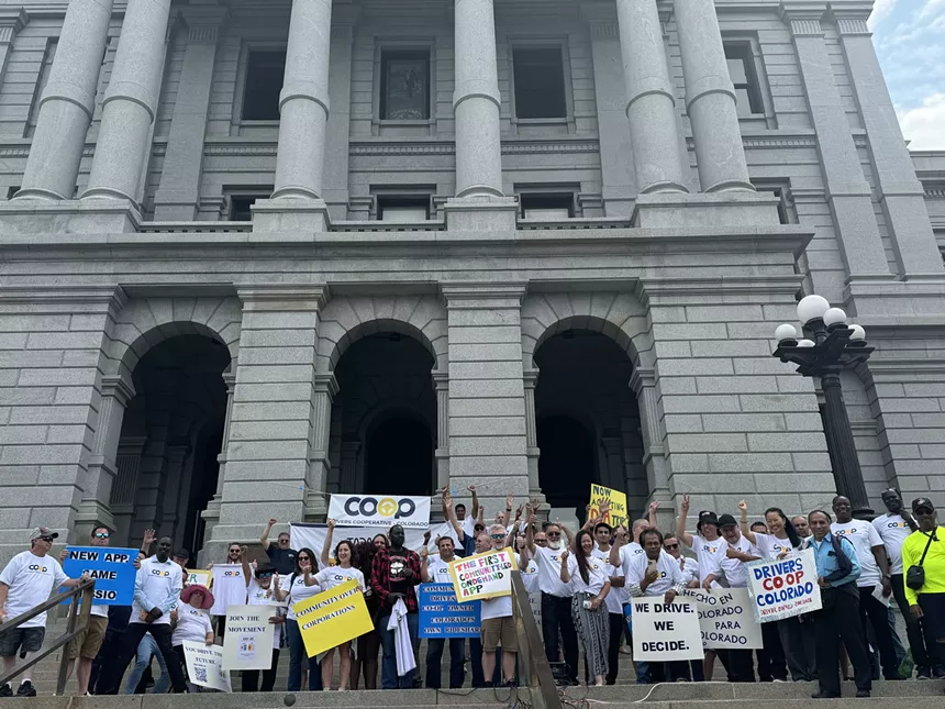People celebrate on colorado capitol steps