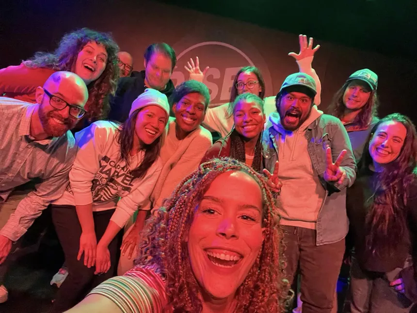 An improv team onstage.