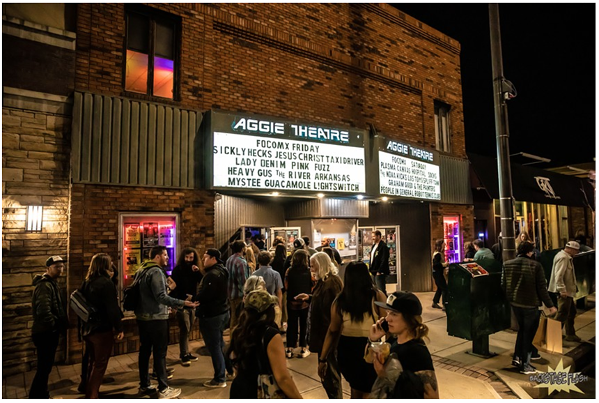 people lining up outside the Aggie Theatre in Fort Collins, Colorado