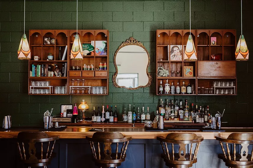 A bar with green walls
