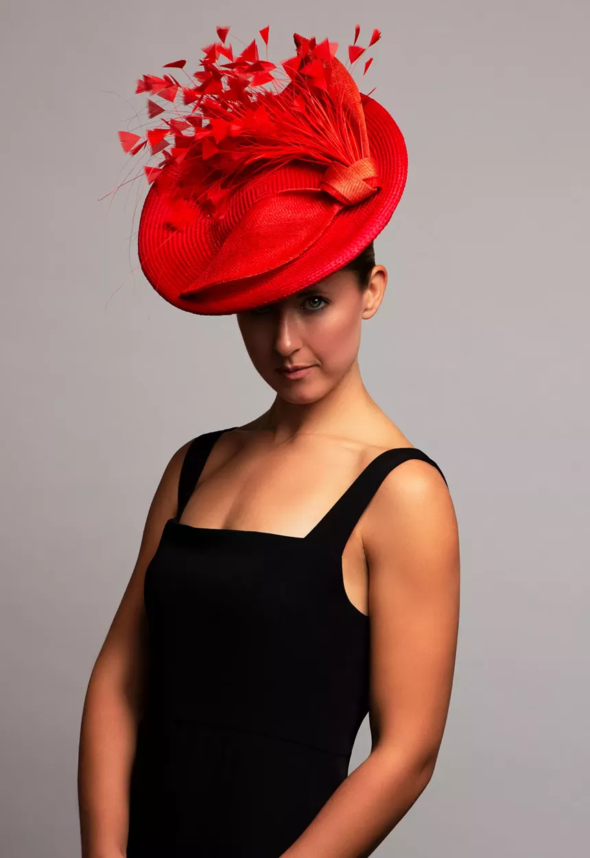 a woman wearing a red hat