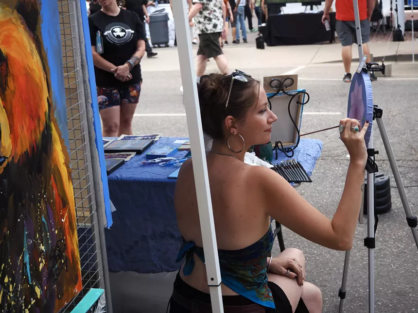 an artist paints