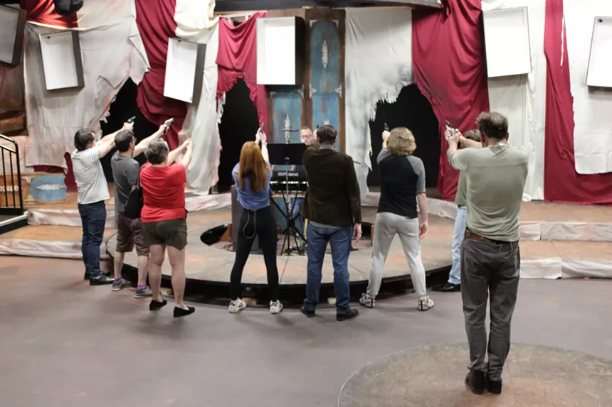 A group of actors onstage.