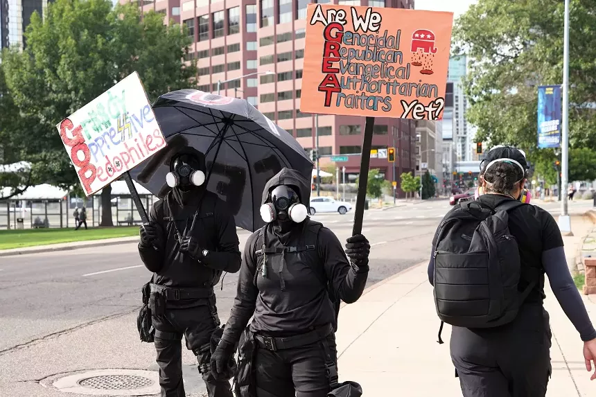 Protesters dressed in black.