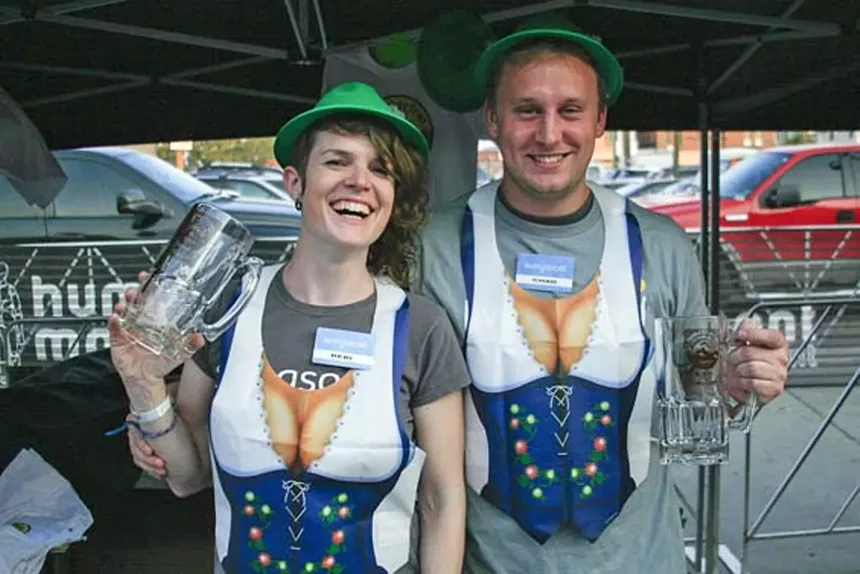 men at Oktoberfest with fake breasts