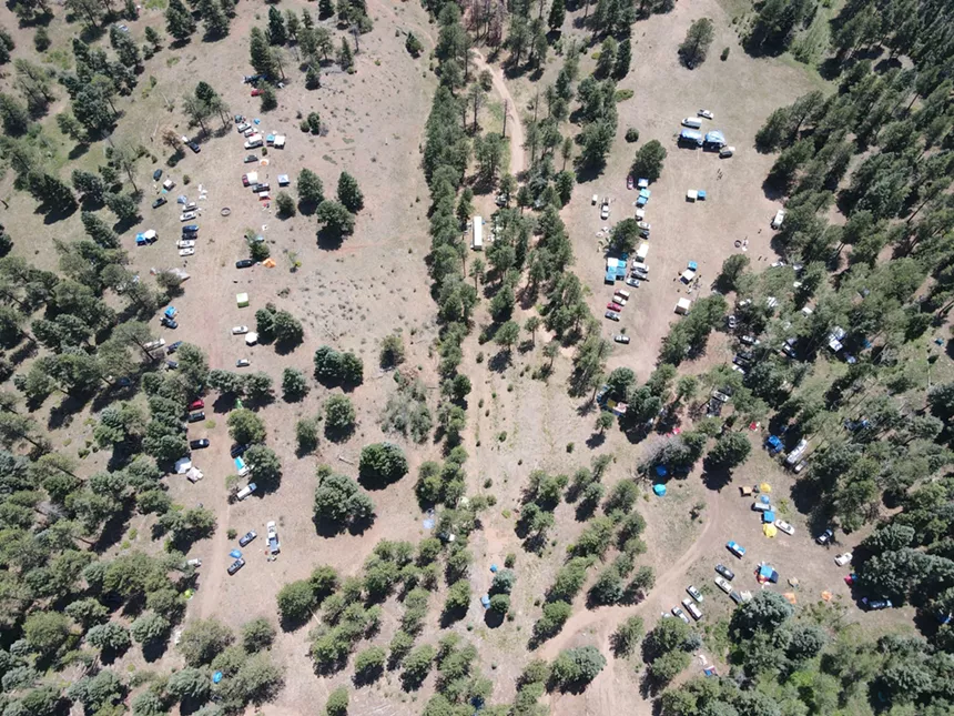 An overhead view of a camping music festival