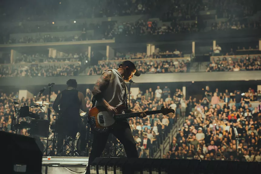 Linkin Park takes the stage at Ball Arena in Denver, Colorado.