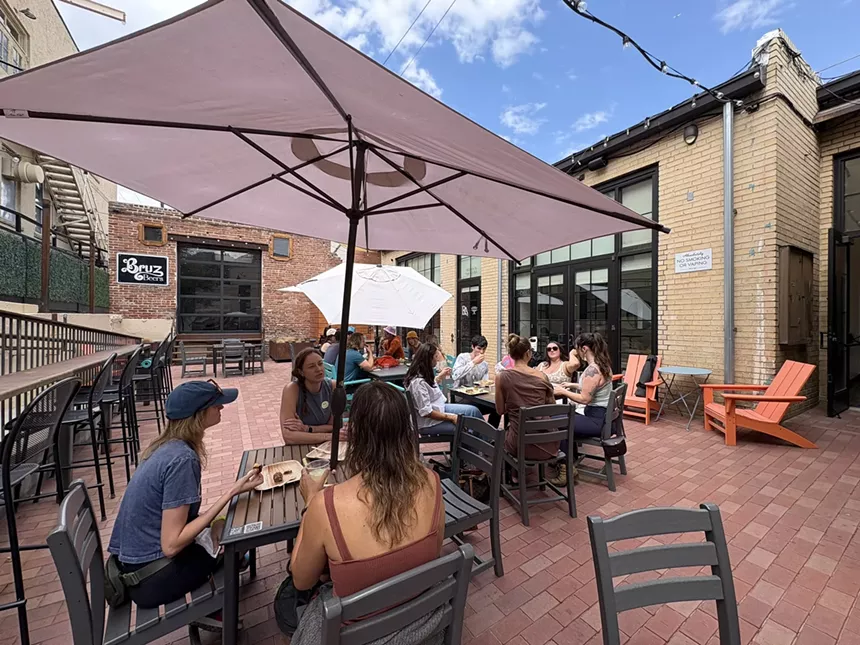 patrons sitting on a patio
