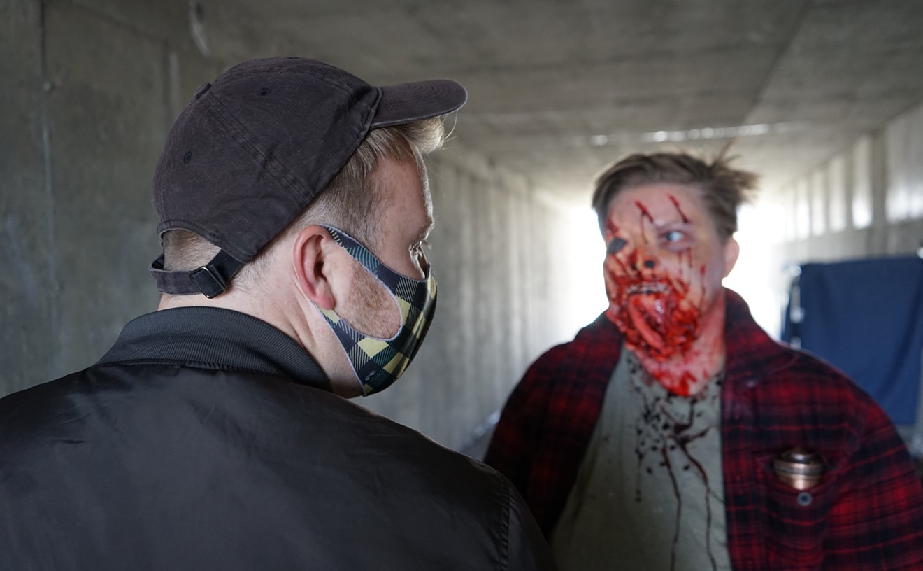 Writer/Director Hunter Burns (left) gets an actor prepped for a special makeup shot.
