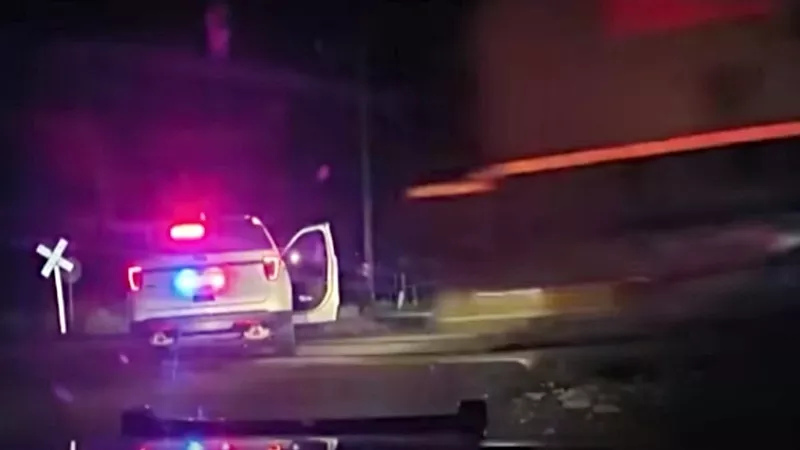 Two Colorado Cops Charged After Police Cruiser Hit By a Train Westword