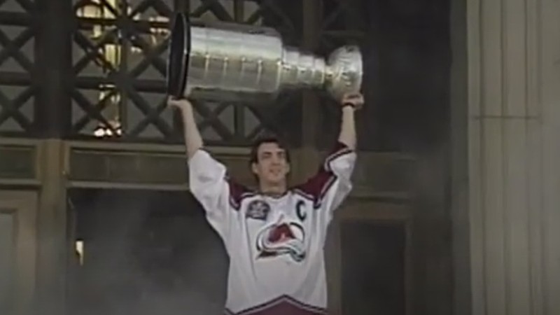 Joe Sakic hoisting the Stanley Cup at the Colorado Avalanche's 1996 victory celebration.