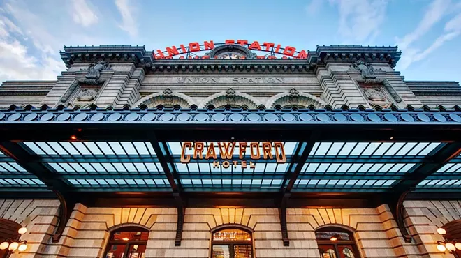 entrance to train station with hotel