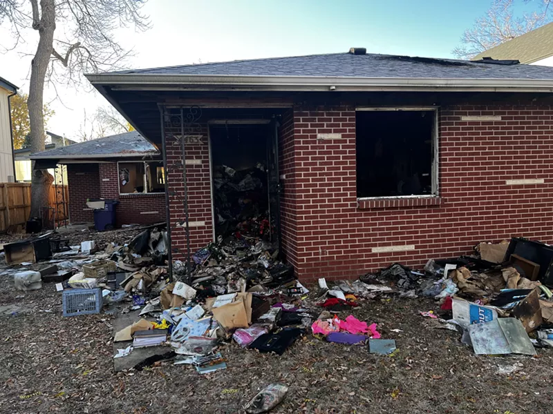 Image: Home after fire with trash thrown around