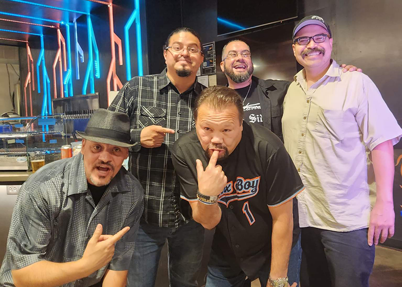Image: Ricky Ramos with fellow comedians and fans at Raíces Brewing Company.