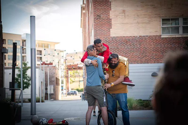 Image: People hug