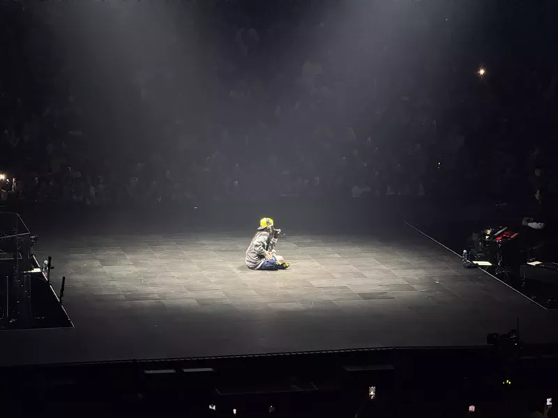 Image: Billie Eilish creates a vocal loop at Ball Arena November 19.