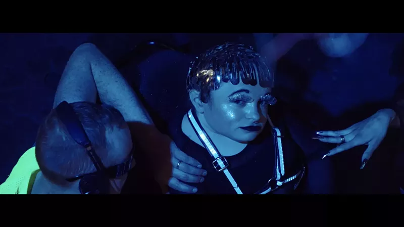 Image: Still from the music video for Wheelchair Sports Camp's "All Access," shot inside Meow Wolf.