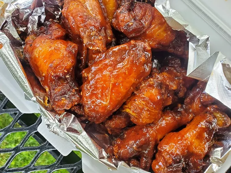 Image: wings in a takeout box