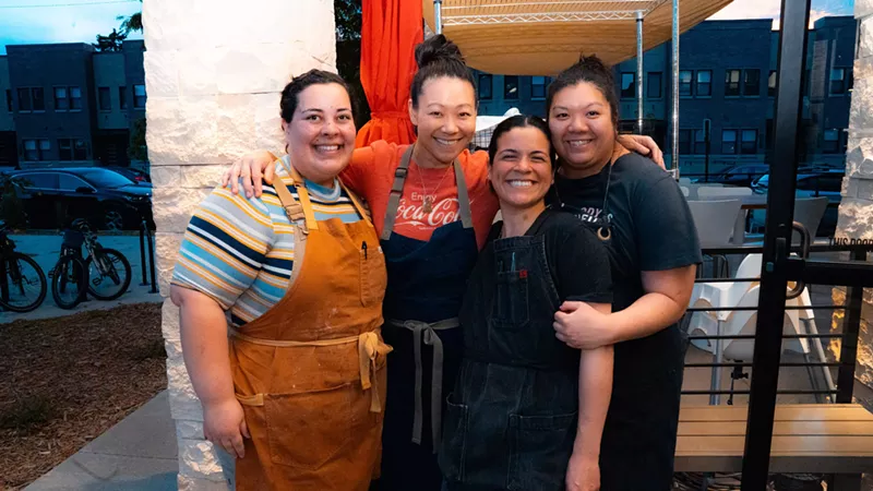 Image: four women in aprons