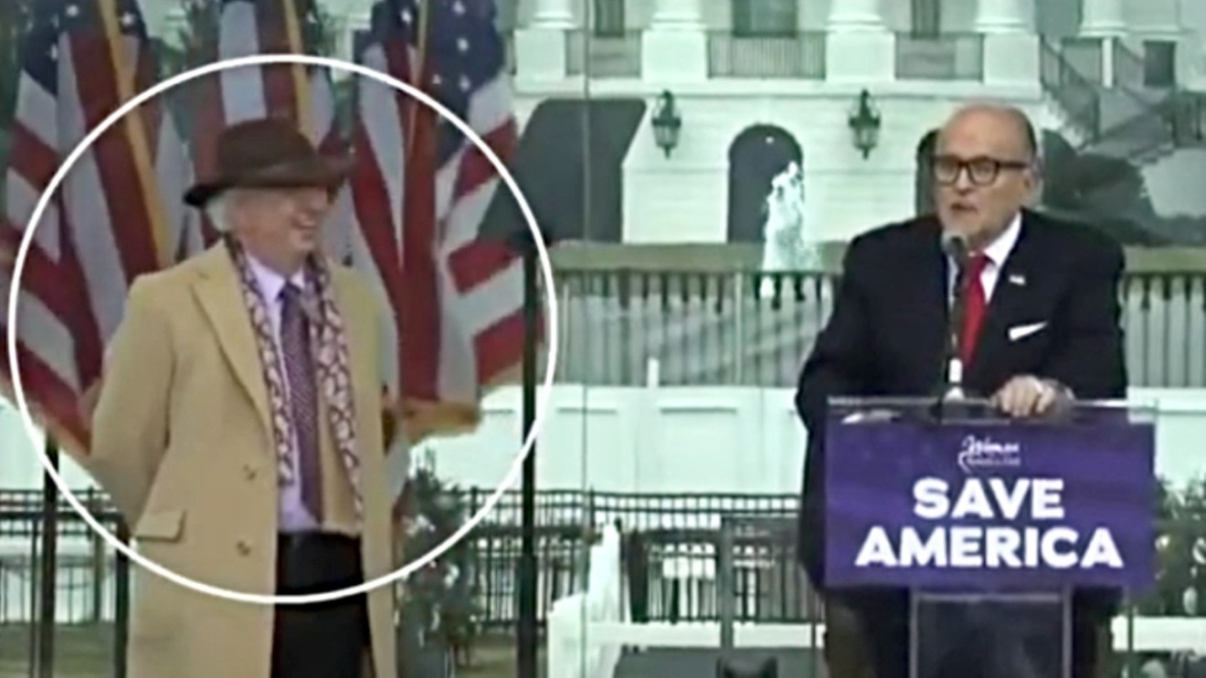 Professor John Eastman, circled, being touted by Trump advisor Rudy Giuliani at a rally prior to the January 6 attack on the U.S. Capitol.