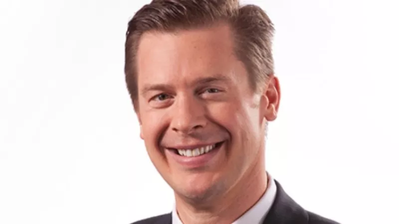 Image: A portrait of Chris Tomer.