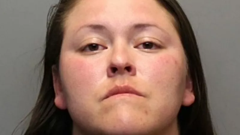 Image: The booking photo of Fort Collins Police Officer Valeri Pedraza.