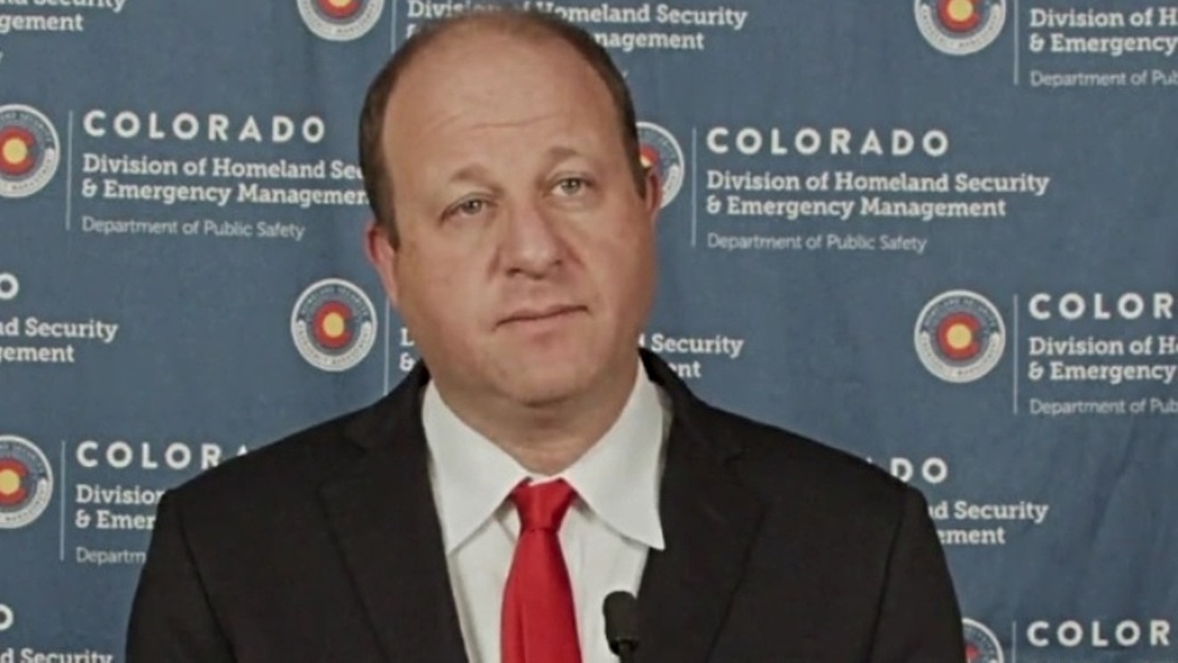 Governor Jared Polis considers a question during a November 19 press conference about COVID-19.