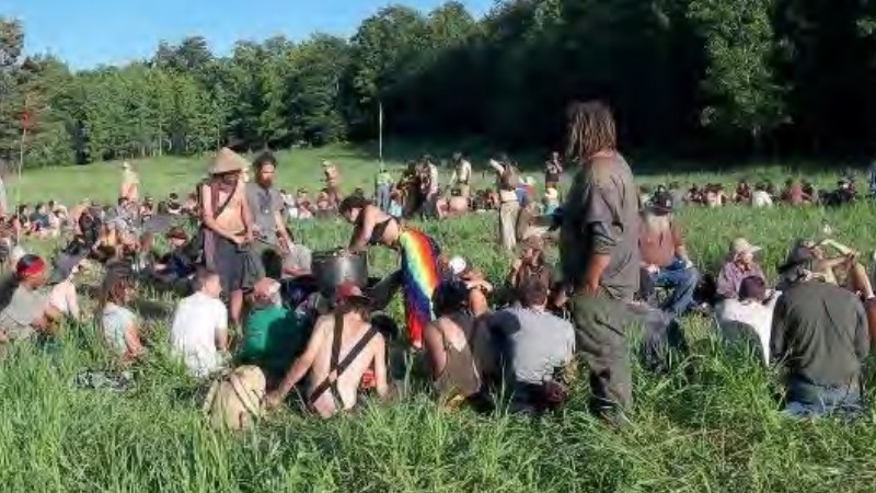 A photo of a past Rainbow Family gathering shared by the U.S. Forest Service in a presentation about planning for the 2022 event.