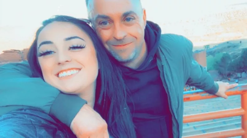 Image: A photo of the late Ryan Harmon with his daughter Ashley during a visit to Red Rocks.