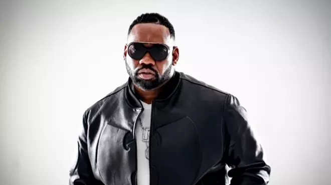 rapper in sunglasses and leather jacket